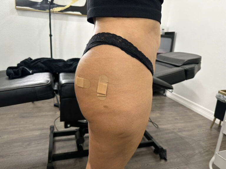 a person with bandages on their side